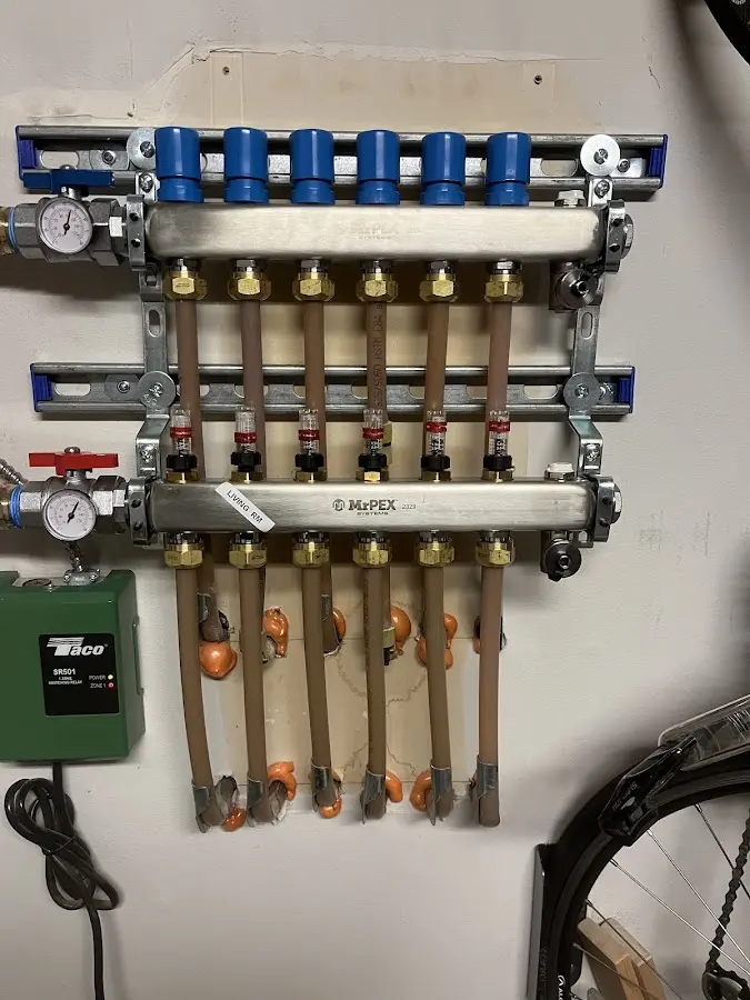 Plumber performing Water Heater Repair at a residential property in Hainesville